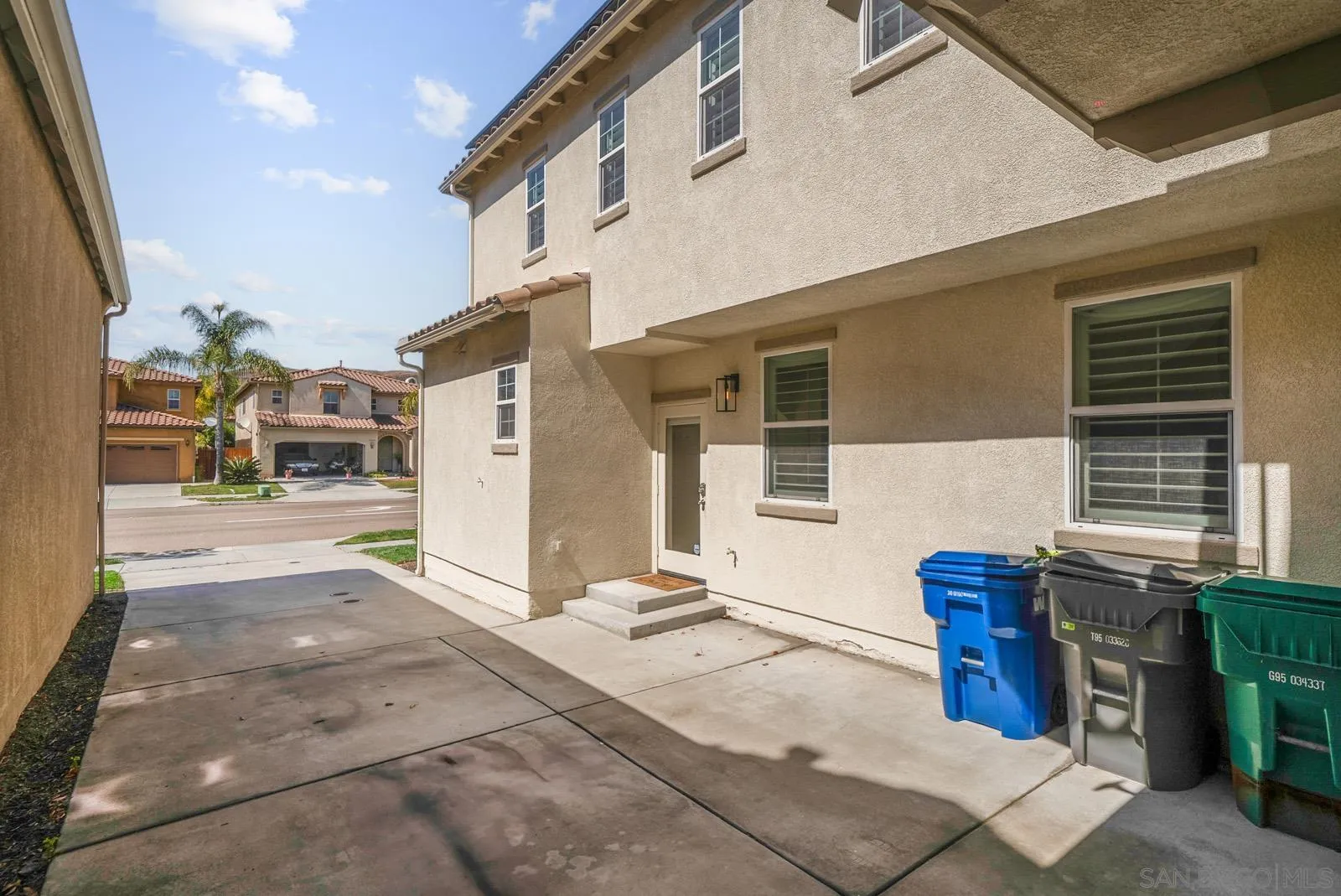 17083 Ralphs Ranch Road San Diego, CA 92127 - Photo 46 of 61 a view of a brick house with many windows