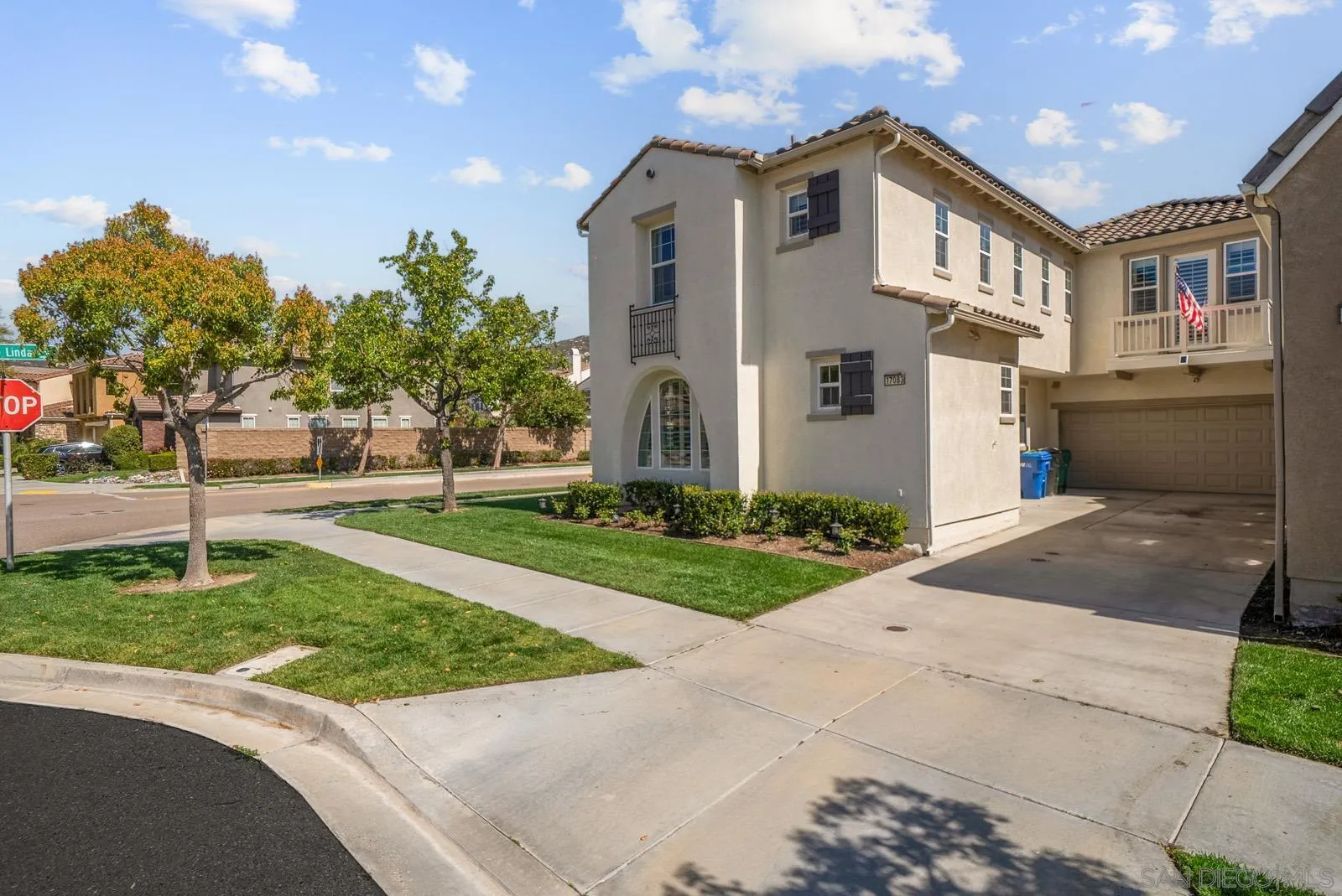 17083 Ralphs Ranch Road San Diego, CA 92127 - Photo 47 of 61 a front view of a house with a yard and trees