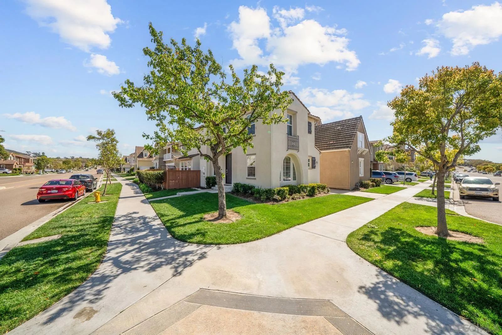 17083 Ralphs Ranch Road San Diego, CA 92127 - Photo 49 of 61 a view of a street with a building and a street sign