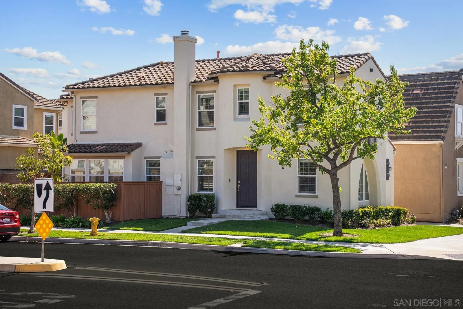 17083 Ralphs Ranch Road San Diego, CA 92127 - Photo 51 of 61 a front view of a house with a yard and garage