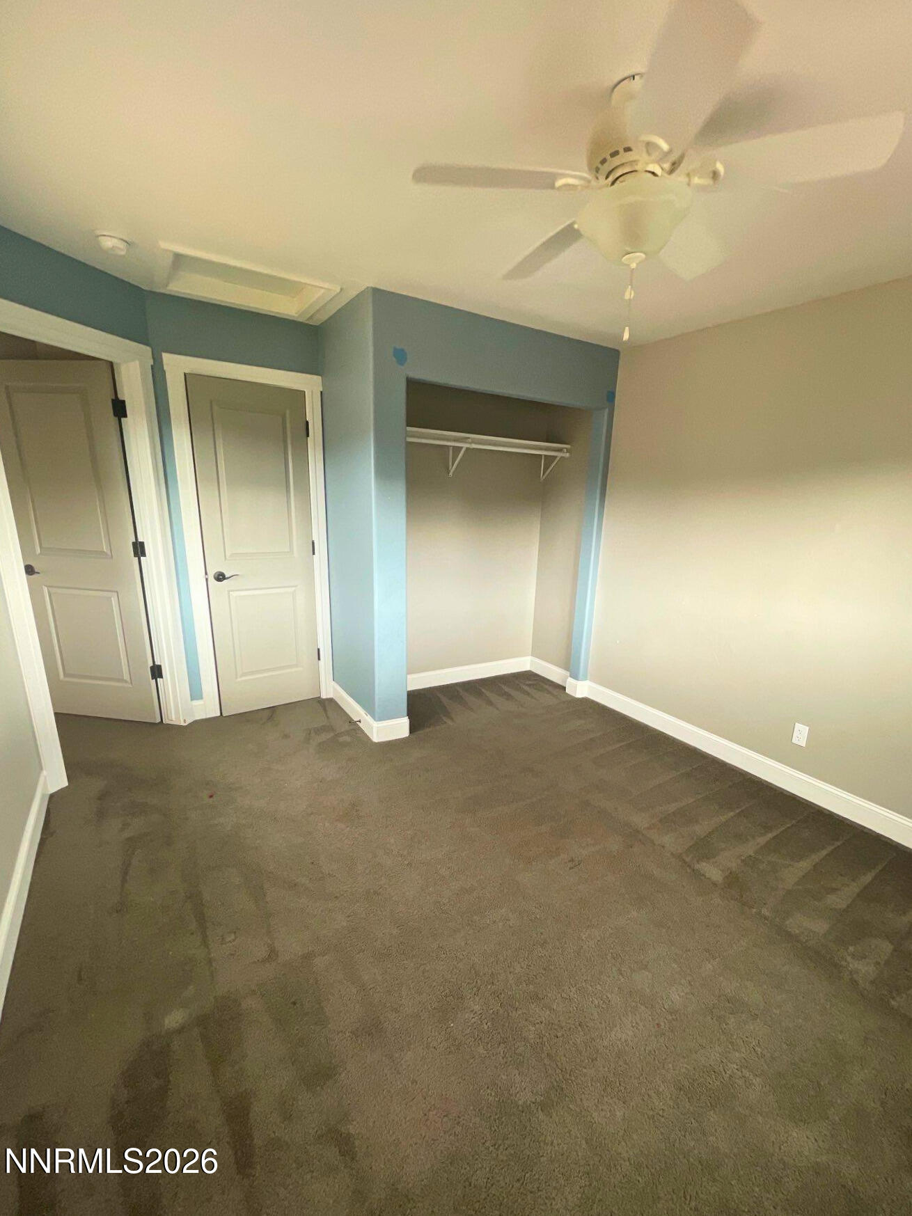 2205 Stowe Drive Reno, NV 89511 - Photo 11 of 17 en empty room with windows and entrance