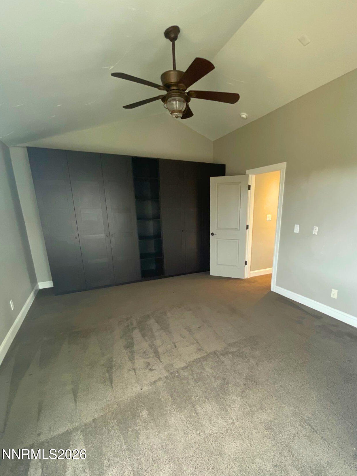 2205 Stowe Drive Reno, NV 89511 - Photo 13 of 17 a view of a livingroom with a ceiling fan and entryway