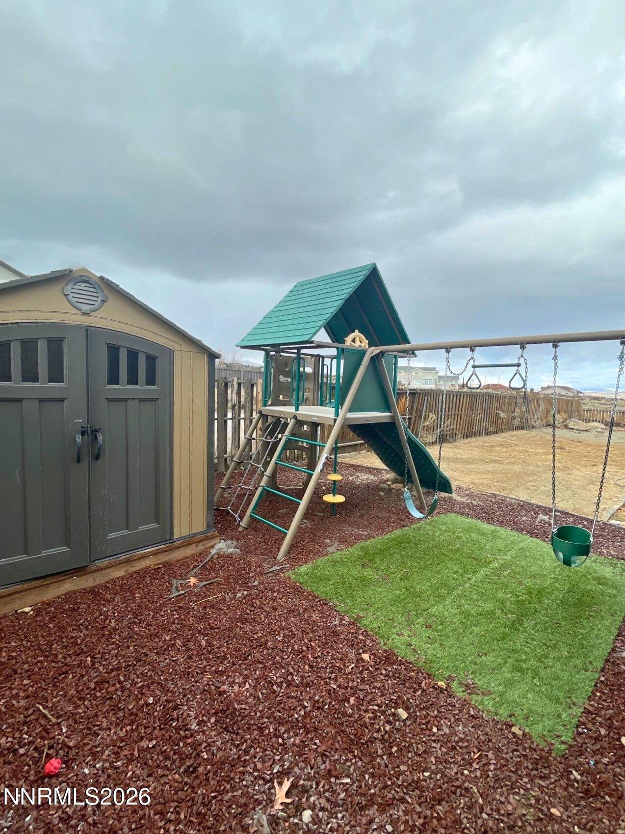 2205 Stowe Drive Reno, NV 89511 - Photo 16 of 17 a view of a house with backyard