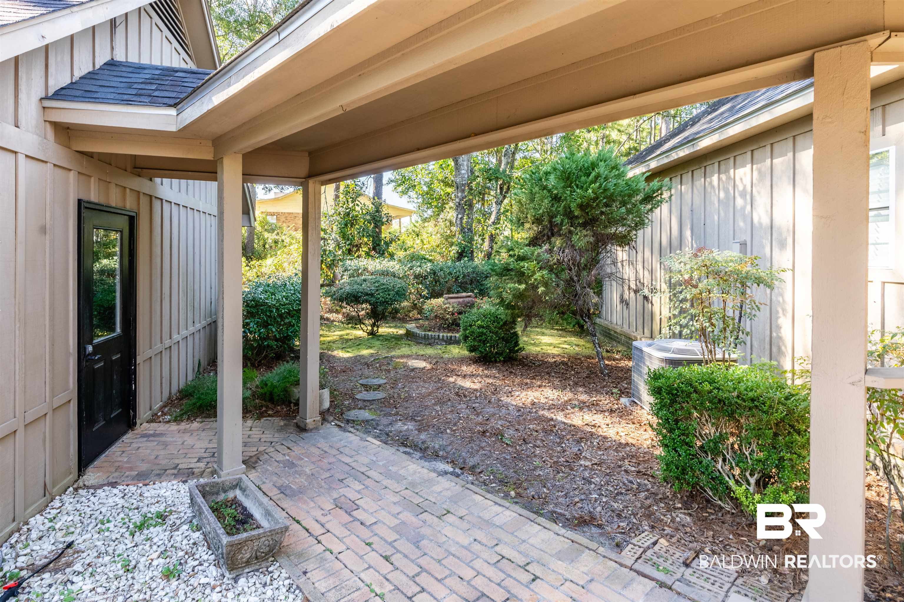 3821 St Andrews Loop East Mobile, AL 36693 - Photo 38 of 41 View of patio / terrace featuring cooling unit