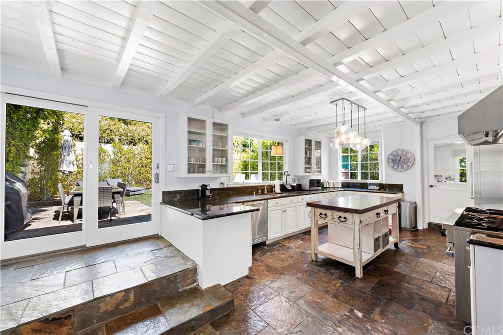 31004 Aliso Circle Laguna Beach, CA 92651 - Photo 11 of 28 a large white kitchen with a large window