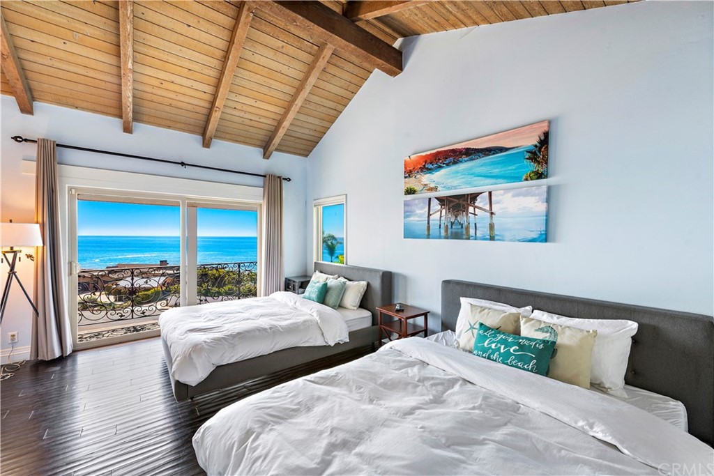 31004 Aliso Circle Laguna Beach, CA 92651 - Photo 19 of 28 a bedroom with two beds and a large window