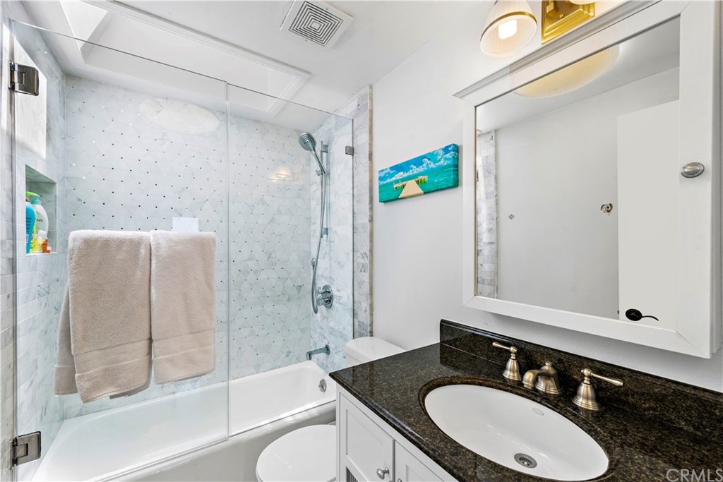 31004 Aliso Circle Laguna Beach, CA 92651 - Photo 20 of 28 a bathroom with a sink toilet and shower