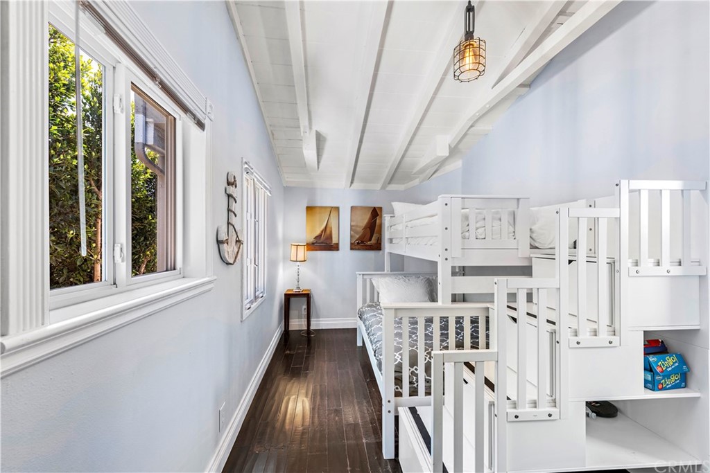 31004 Aliso Circle Laguna Beach, CA 92651 - Photo 21 of 28 a view of a hallway with wooden floor and furniture