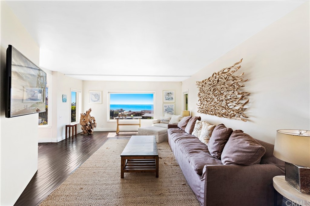 31004 Aliso Circle Laguna Beach, CA 92651 - Photo 7 of 28 a living room with furniture and a flat screen tv