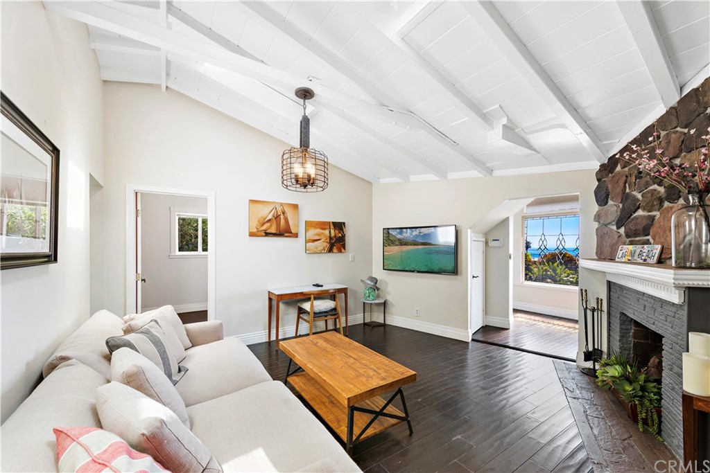 31004 Aliso Circle Laguna Beach, CA 92651 - Photo 10 of 28 a living room with furniture and a fireplace