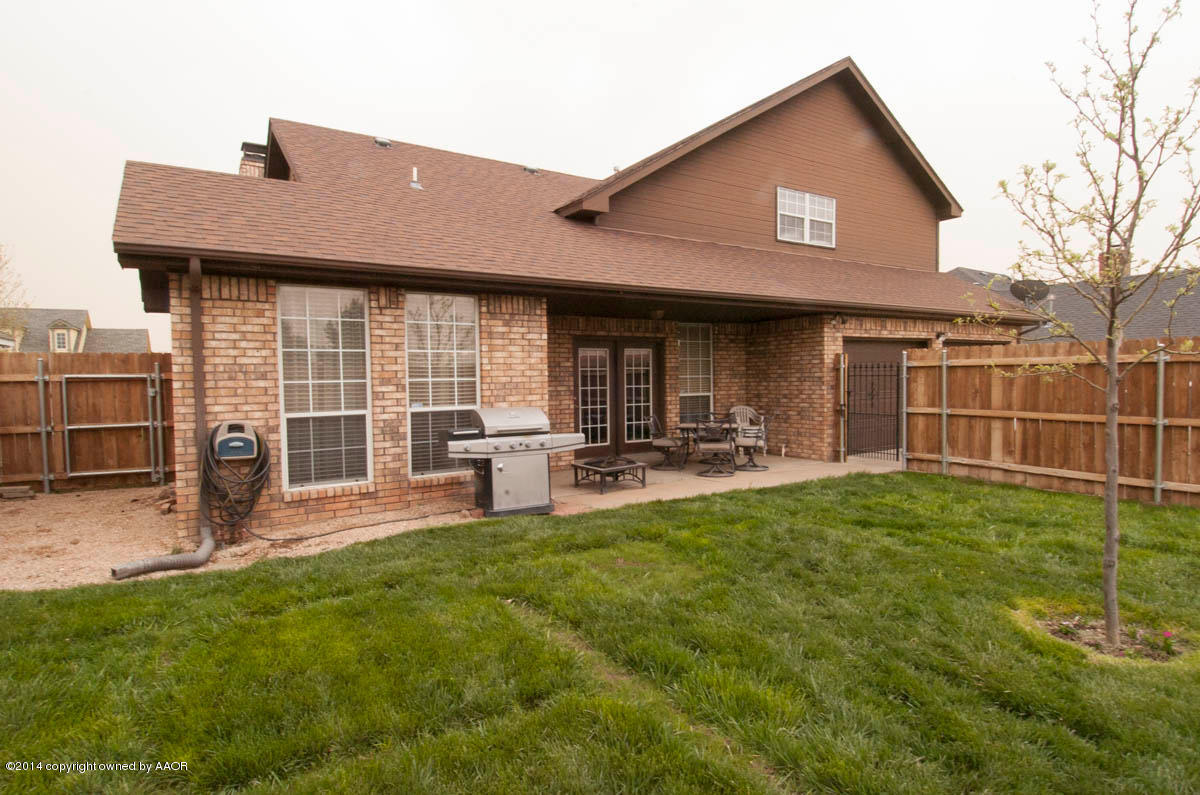 8104 Sheldon Road Amarillo, TX 79119 - Photo 19 of 22 View of Back Yard & House