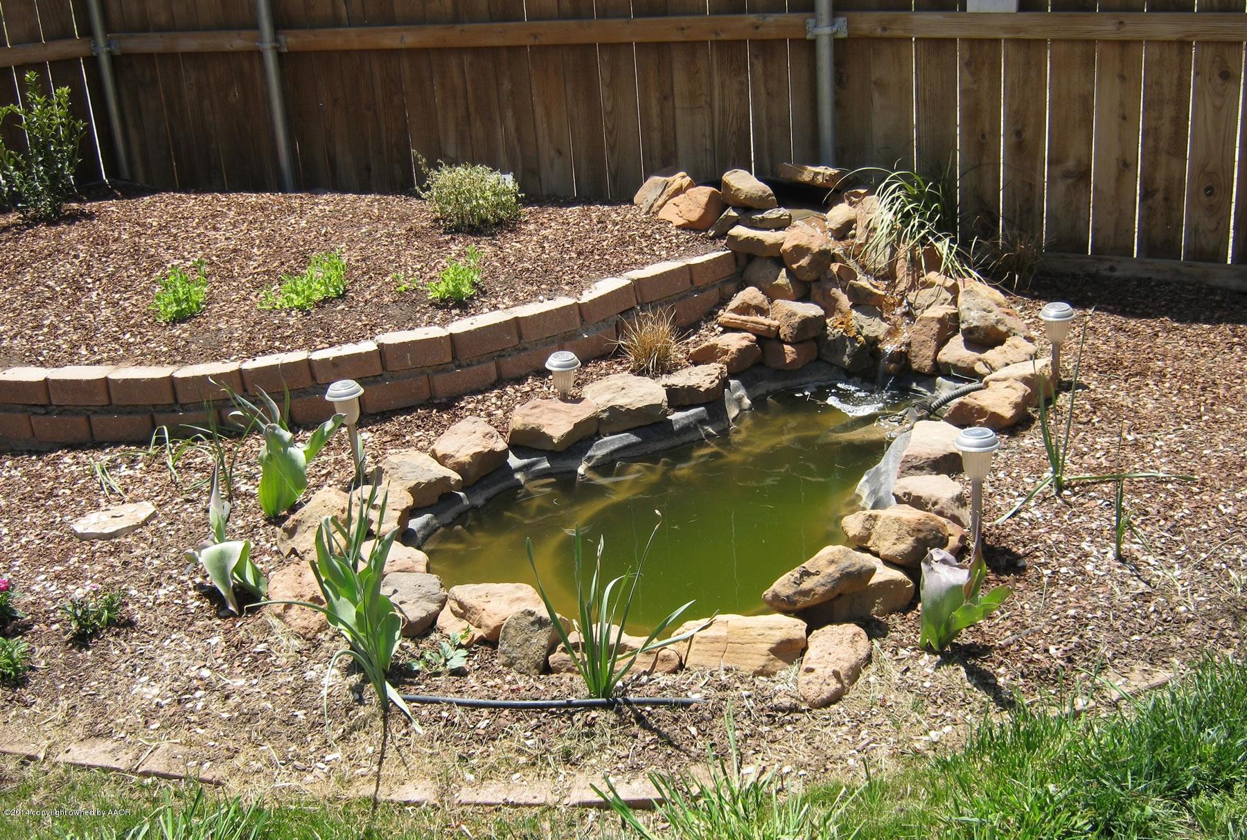 8104 Sheldon Road Amarillo, TX 79119 - Photo 20 of 22 Koi Pond & Solar-powered waterfall