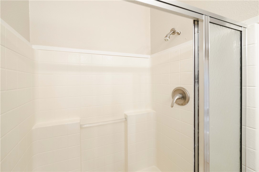 4729 Stewart Mountain Road Golden Valley, AZ 86413 - Photo 15 of 28 a bathroom with a shower