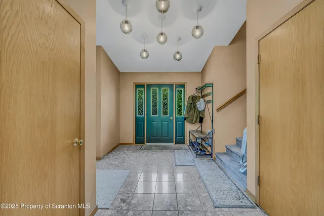 a bed room with furniture and a window