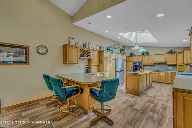 a utility room with a stove and a shower