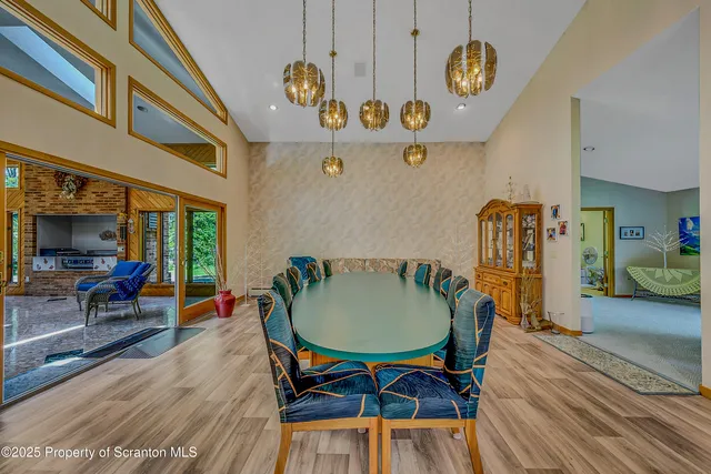 a bedroom with a bed a dresser and a window