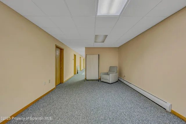a view of a garage with a table and chairs