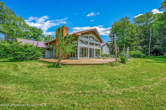 a house view with a garden space