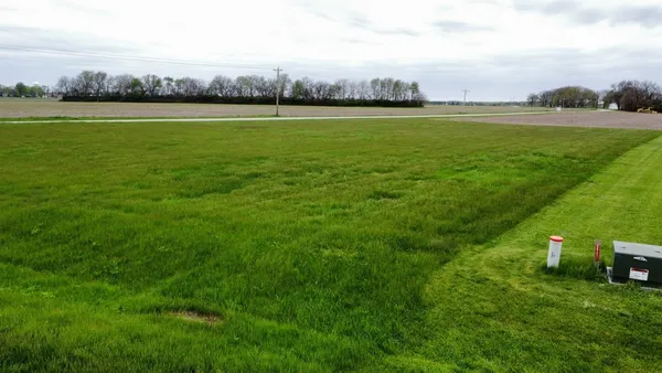 a view of a field with clear sky