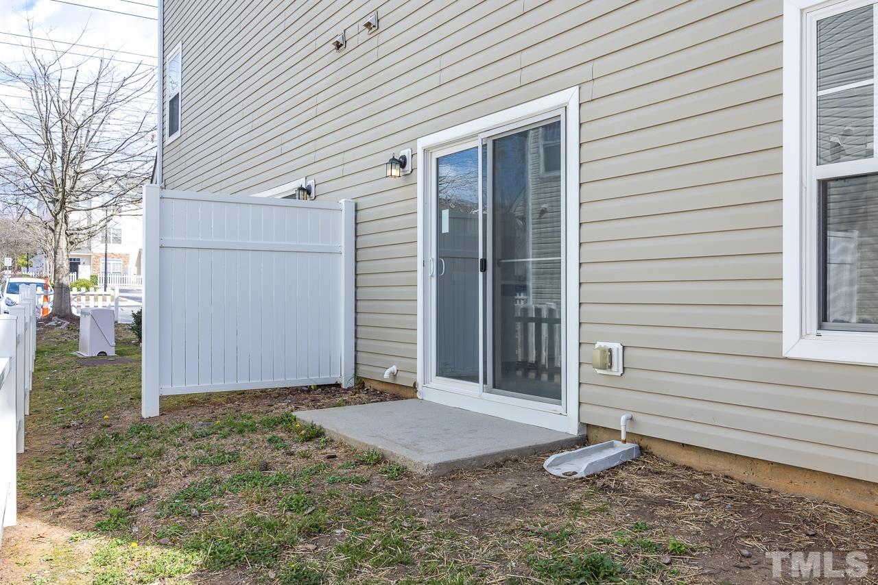 330 Gilman Lane, Unit 111 Raleigh, NC 27610 - Photo 24 of 26 a view of a house with backyard