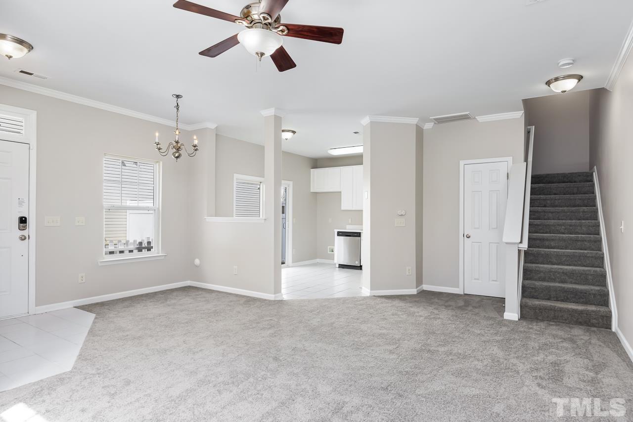330 Gilman Lane, Unit 111 Raleigh, NC 27610 - Photo 7 of 26 a view of an empty room with a window