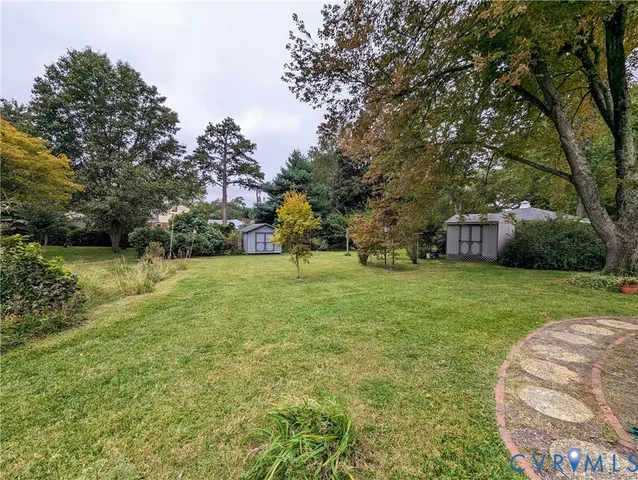 a view of a garden with trees