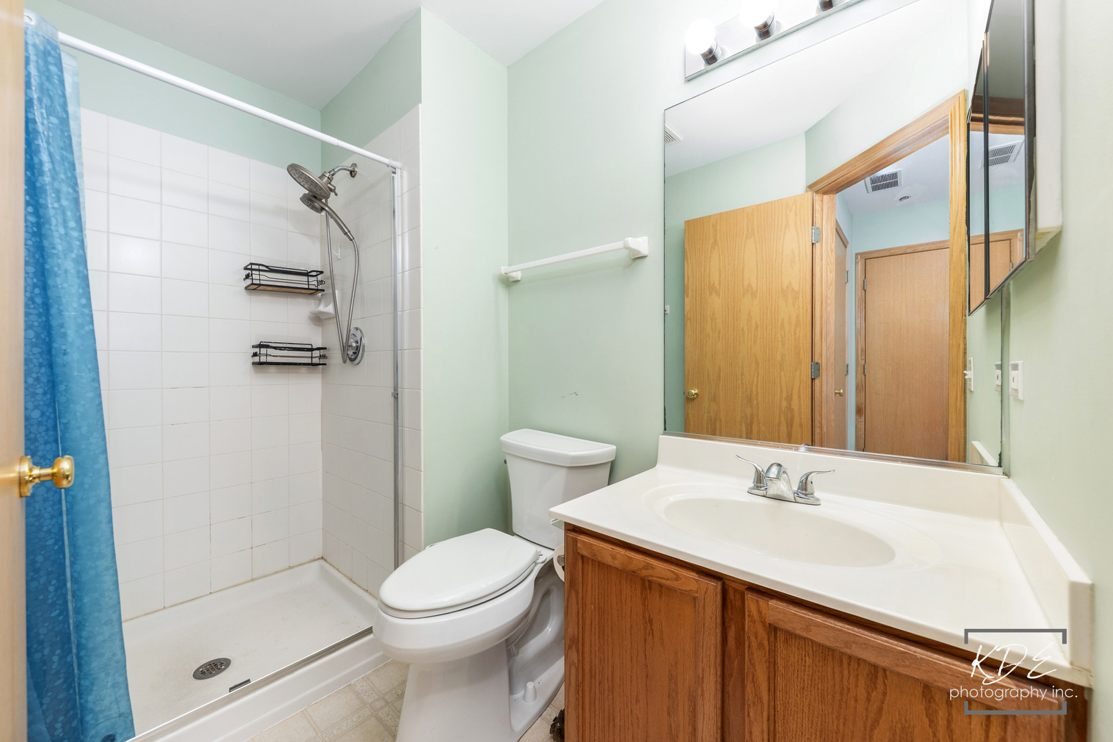 2330 Twilight Drive Aurora, IL 60503 - Photo 15 of 27 a bathroom with a sink a toilet and shower