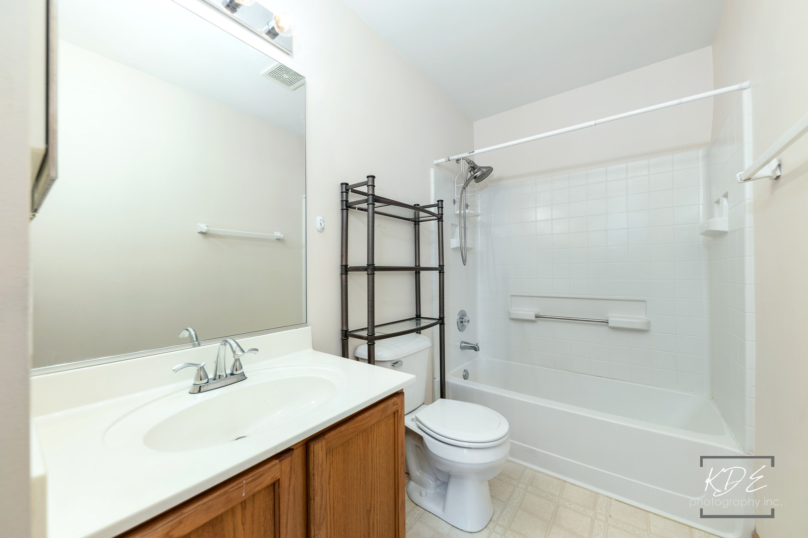 2330 Twilight Drive Aurora, IL 60503 - Photo 18 of 27 a bathroom with a sink toilet and shower