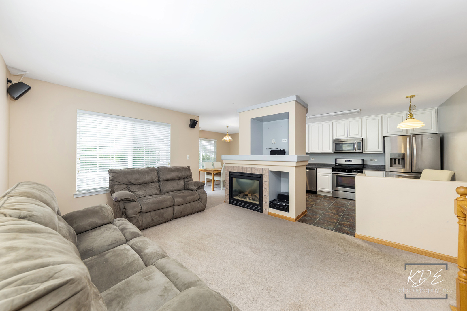 2330 Twilight Drive Aurora, IL 60503 - Photo 2 of 27 a living room with furniture and a fireplace