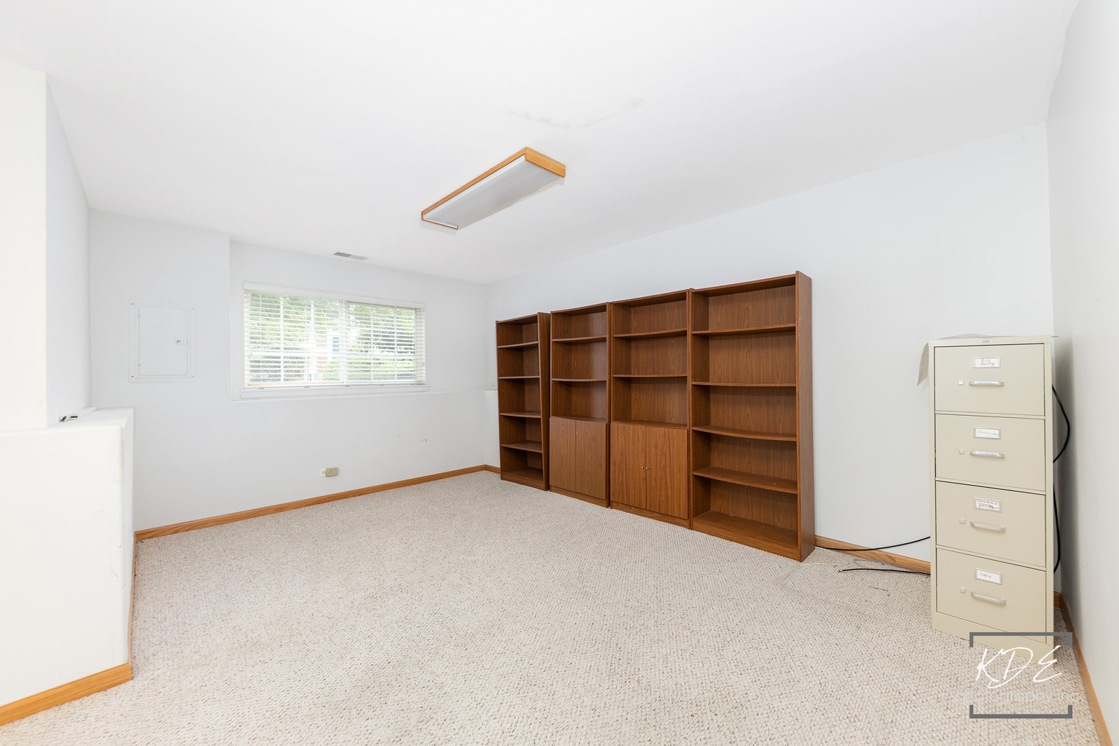 2330 Twilight Drive Aurora, IL 60503 - Photo 21 of 27 an empty room with a window and cabinet