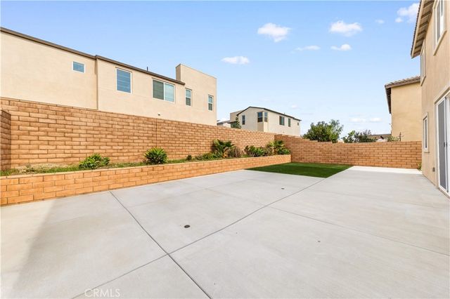 a view of a large body of water with lots of buildings in the background