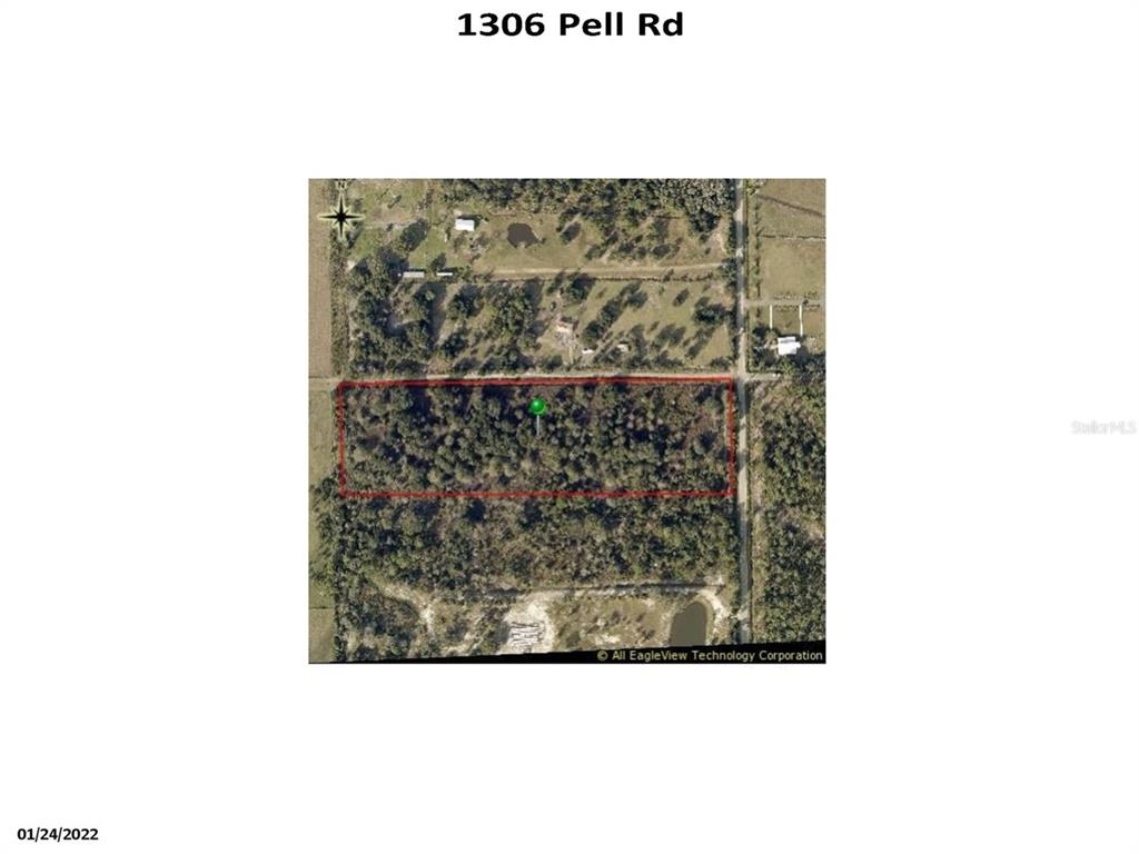 1306 Pell Road Osteen, FL 32764 - Photo 4 of 4 a picture of a bench in the background