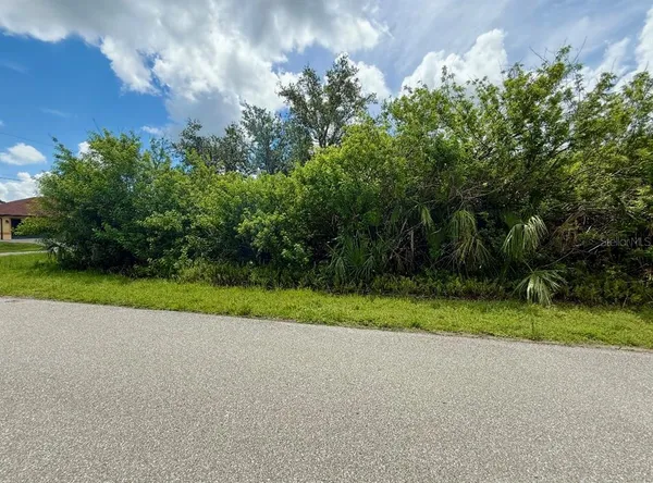 a view of outdoor space and yard