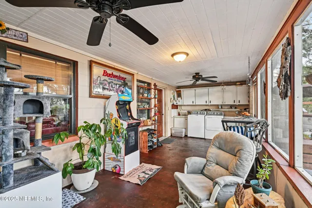 a view of a chairs and table in the patio