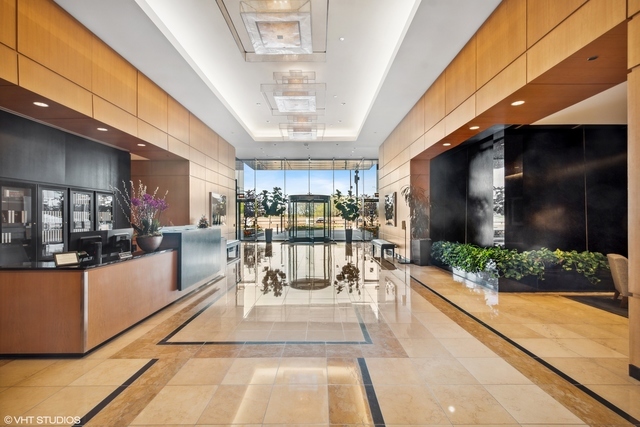 600 North Lake Shore Drive, Unit 1110 Chicago, IL 60611 - Photo 13 of 35 a view of a lobby with black carpet