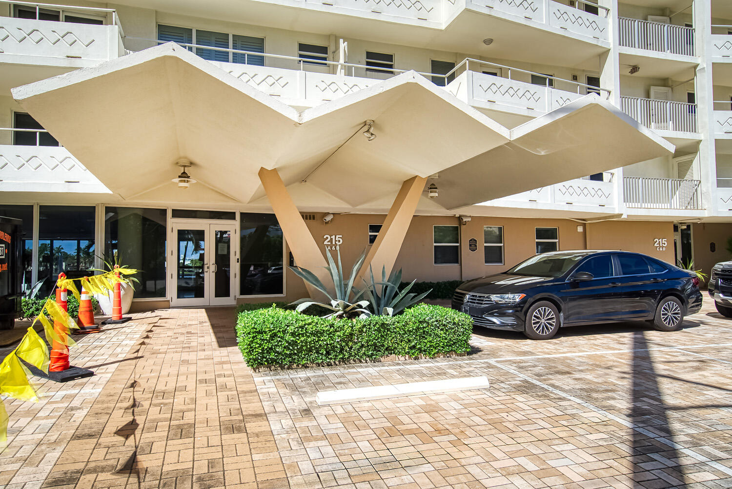 215 North Birch Road, Unit 5B Fort Lauderdale, FL 33304 - Photo 11 of 73 a view of a car in front of house