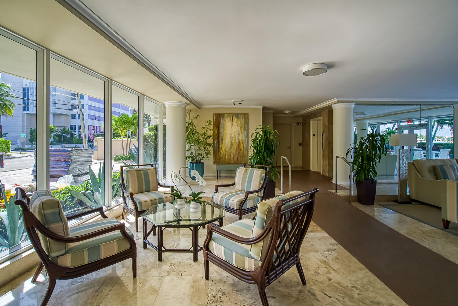 215 North Birch Road, Unit 5B Fort Lauderdale, FL 33304 - Photo 12 of 73 a living room with furniture and a floor to ceiling window