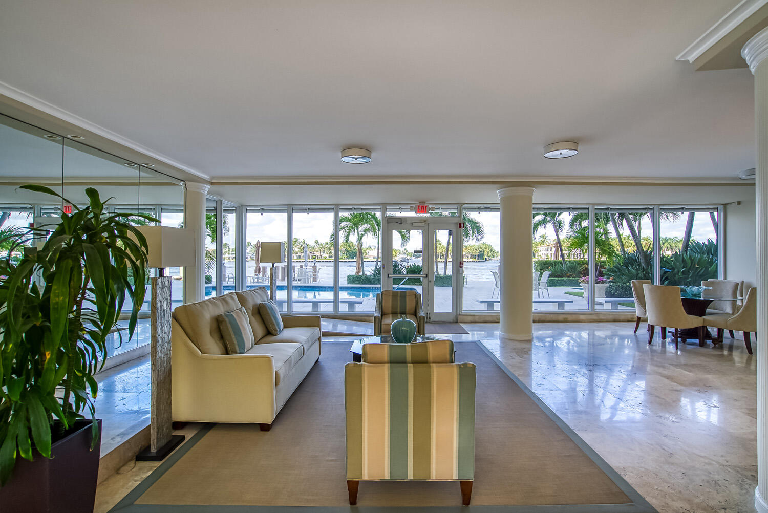 215 North Birch Road, Unit 5B Fort Lauderdale, FL 33304 - Photo 13 of 73 a living room with furniture and a large window with outer view