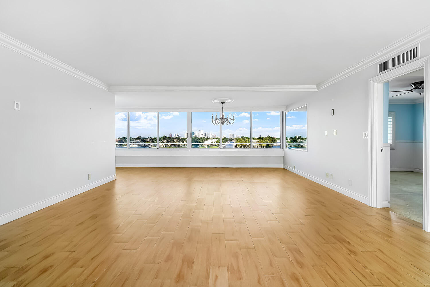 215 North Birch Road, Unit 5B Fort Lauderdale, FL 33304 - Photo 22 of 73 a view of a kitchen with a sink and a refrigerator