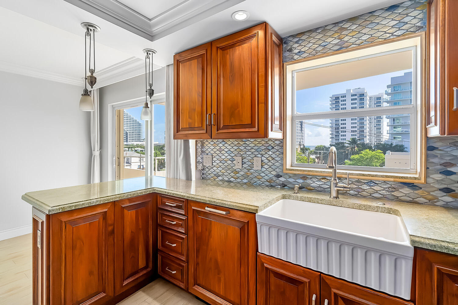 215 North Birch Road, Unit 5B Fort Lauderdale, FL 33304 - Photo 37 of 73 a kitchen with stainless steel appliances granite countertop a sink and a cabinets