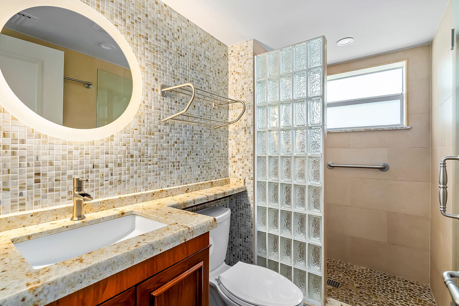 215 North Birch Road, Unit 5B Fort Lauderdale, FL 33304 - Photo 41 of 73 a bathroom with a sink a toilet and shower