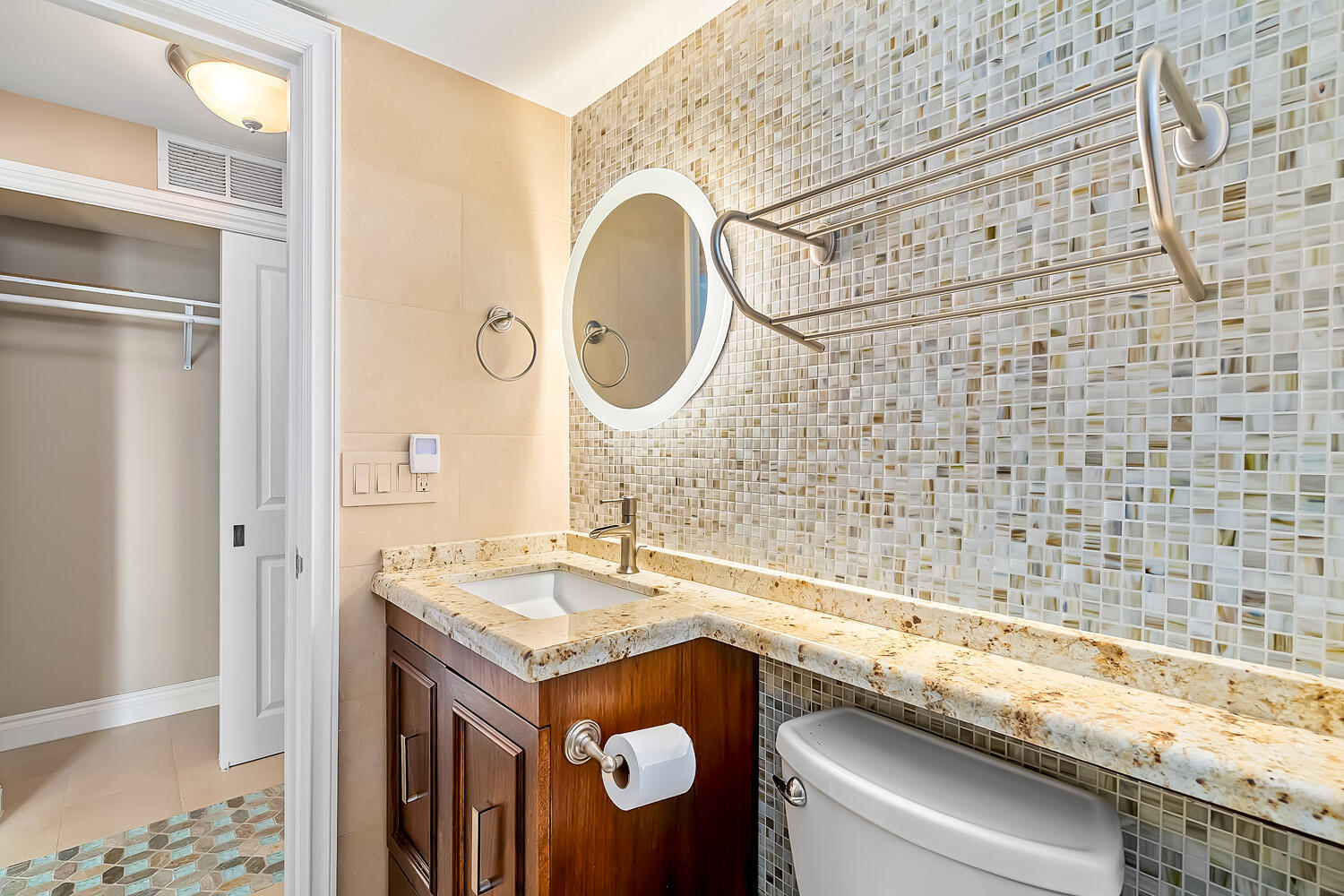 215 North Birch Road, Unit 5B Fort Lauderdale, FL 33304 - Photo 42 of 73 a bathroom with a sink and a mirror