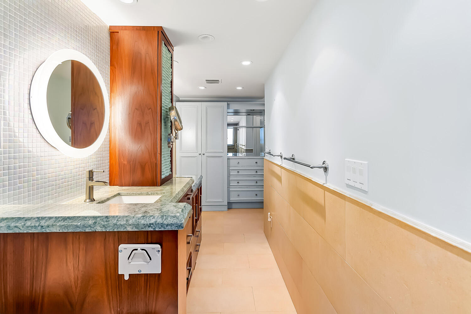 215 North Birch Road, Unit 5B Fort Lauderdale, FL 33304 - Photo 53 of 73 a bathroom with a granite countertop sink and a mirror