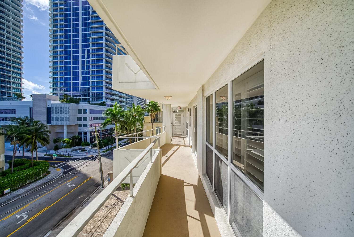 215 North Birch Road, Unit 5B Fort Lauderdale, FL 33304 - Photo 65 of 73 a view of balcony with a large window and potted plants
