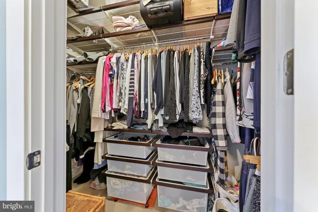 a bedroom with a bed and furniture