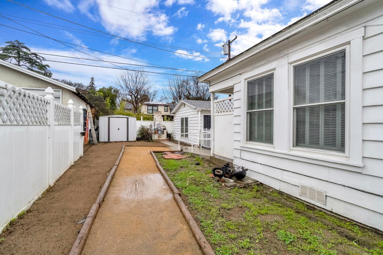 215 East Clinton Avenue Fresno, CA 93704 - Photo 28 of 29 a view of a house with a swimming pool