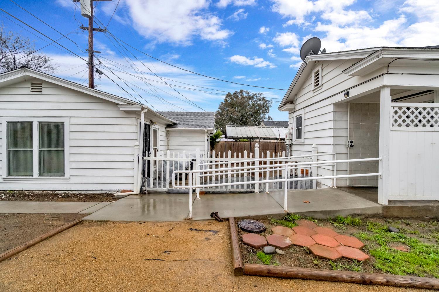 215 East Clinton Avenue Fresno, CA 93704 - Photo 29 of 29 a front view of a house with a balcony