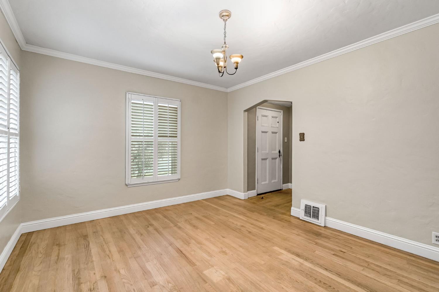 215 East Clinton Avenue Fresno, CA 93704 - Photo 9 of 29 a view of an empty room with a window