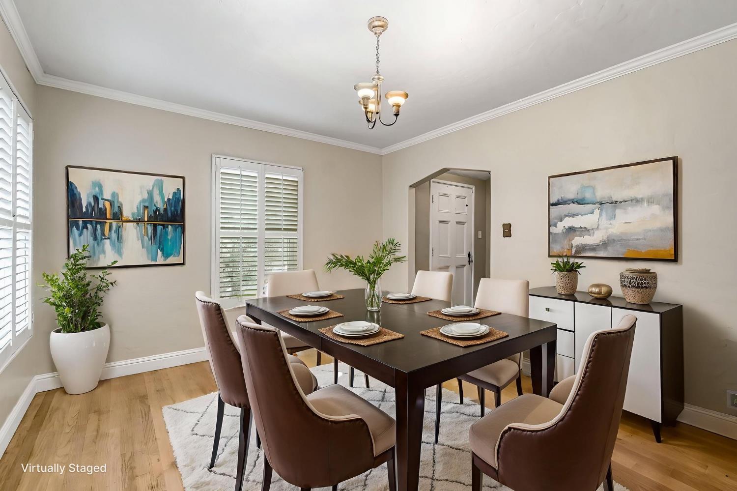 215 East Clinton Avenue Fresno, CA 93704 - Photo 10 of 29 a view of a dining room with furniture window and wooden floor