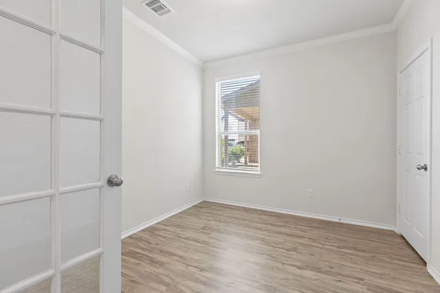 wooden floor in a hall with an entryway and wooden floor